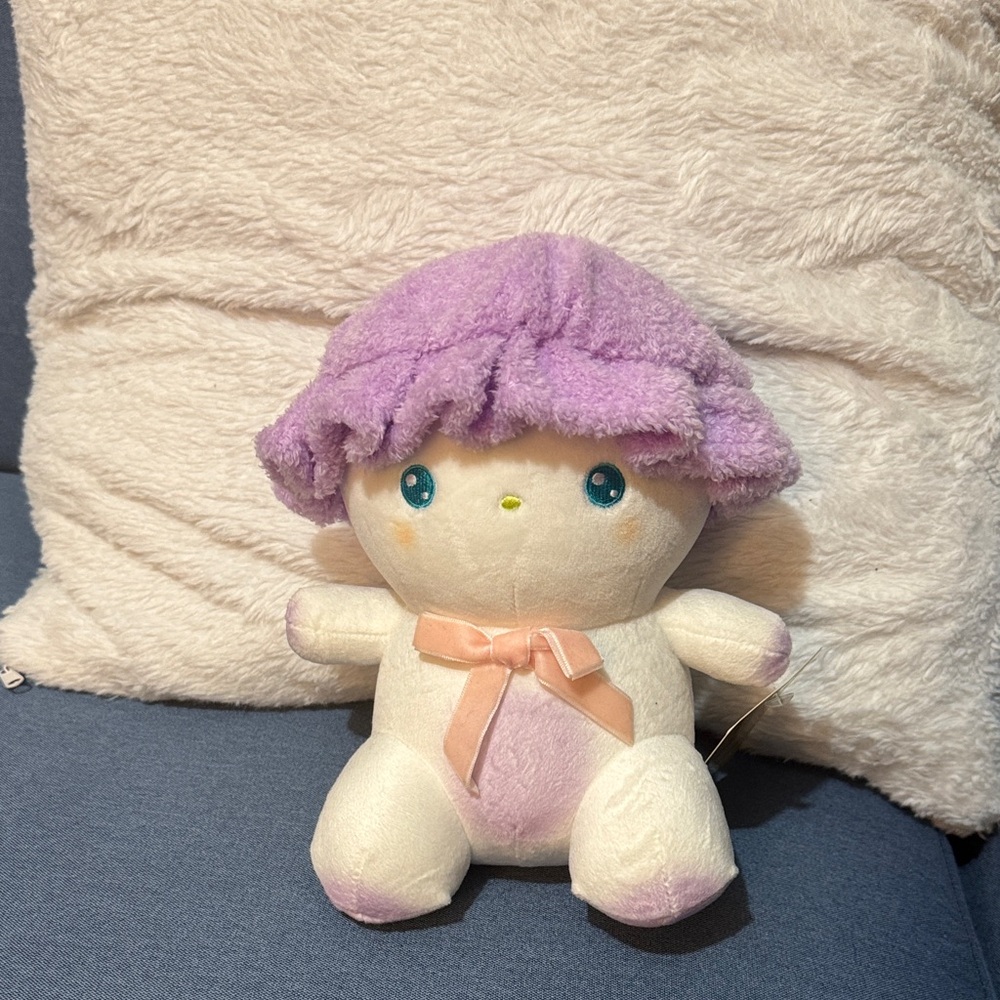 Adorable Plush Toy with Purple Hat